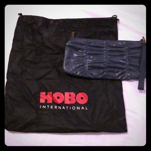Hobo International midnight blue clutch.